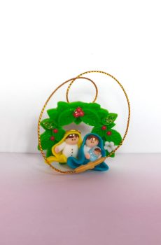 Mini pesebre  con corona navideña